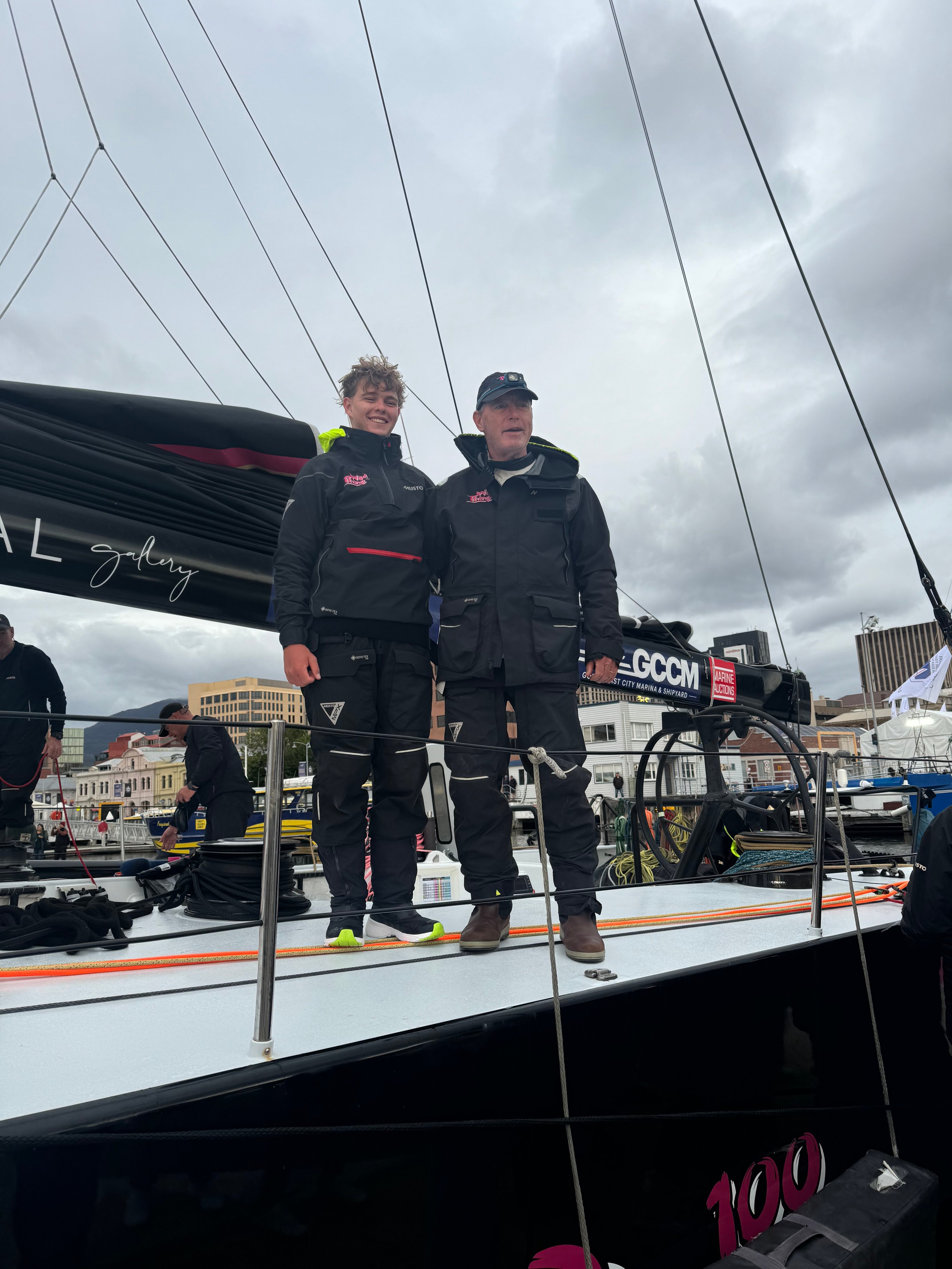 Ben Crafoord (l) and Carl Crafoord (r) aboard Wild Thing 100 at Hobart's Constitution Dock